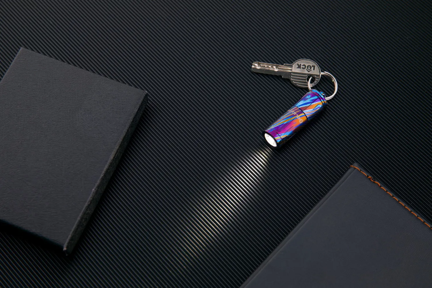 Olight iXV Titanium Damascus Keychain Light - Olight Canada
